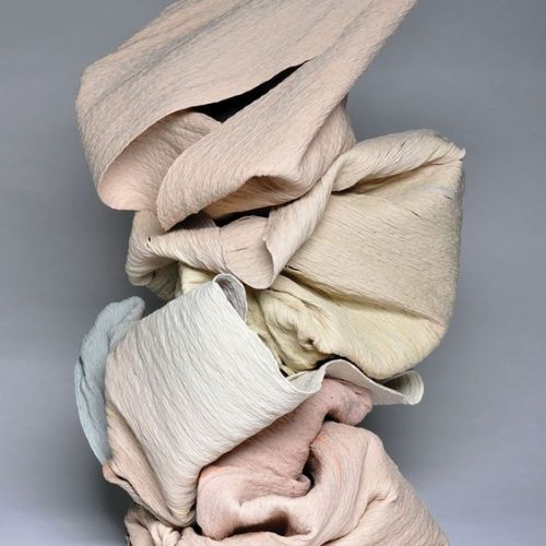 1708248207863-pile-of-pastel-sustanable-fabric